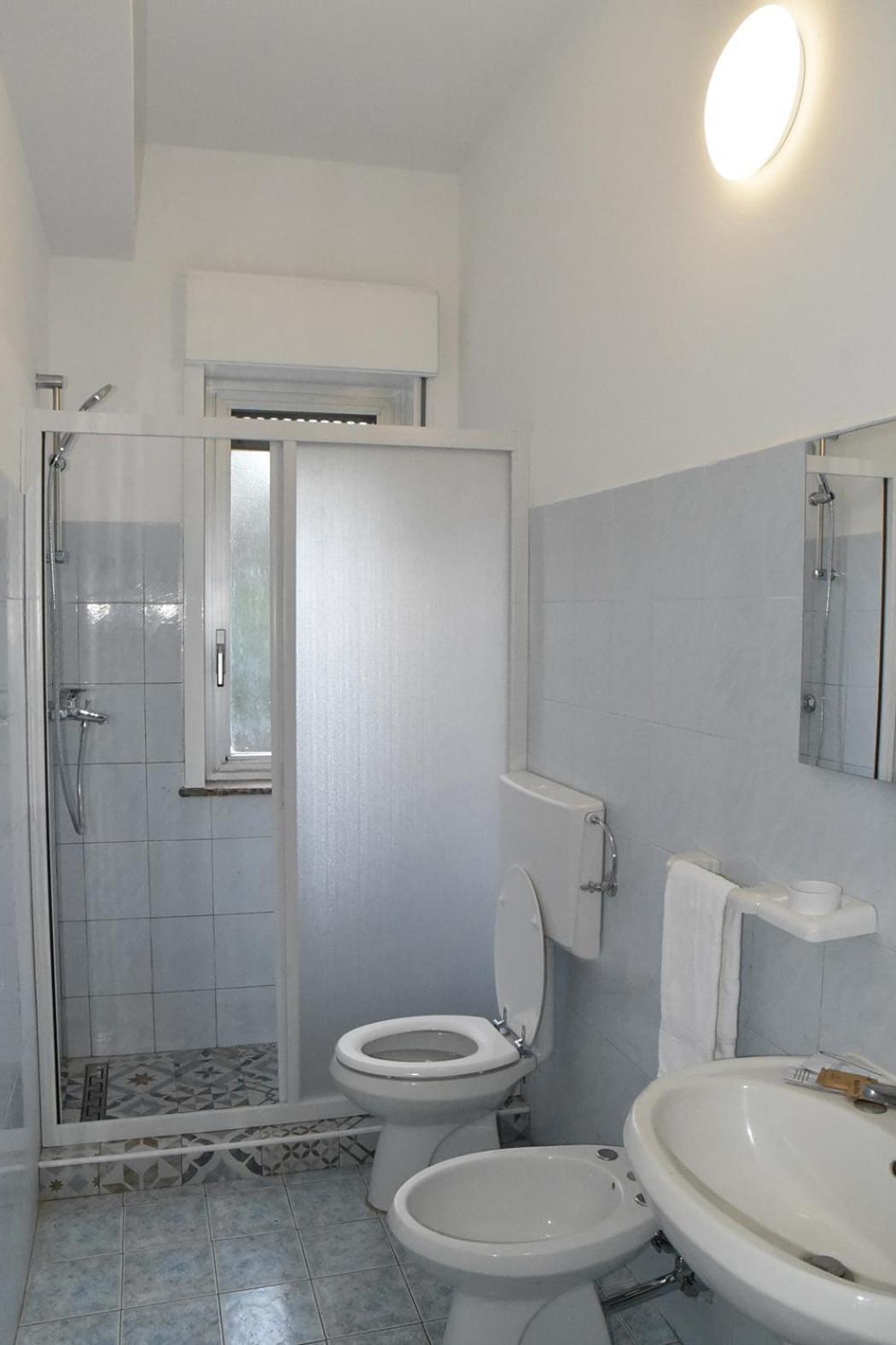 Appartamenti La Baia Del Rais ファルコーネ 部屋 写真